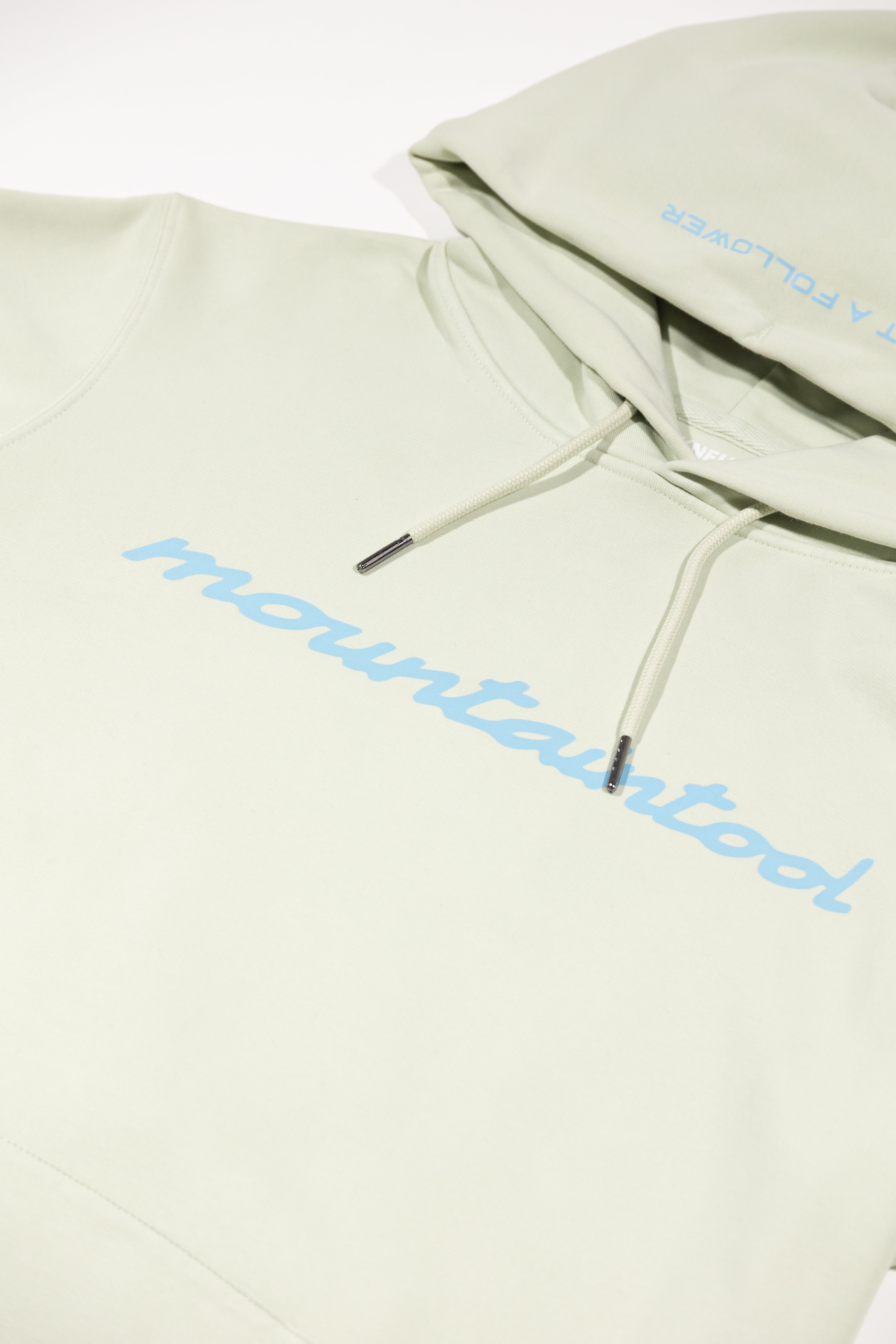 MOUNTAINTOOL HOODIE mit Badge Mint Grün